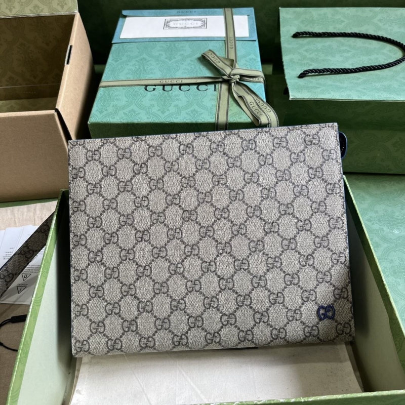 G*u*i clutch bags